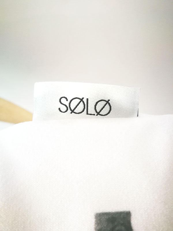 solo signature pillow tag